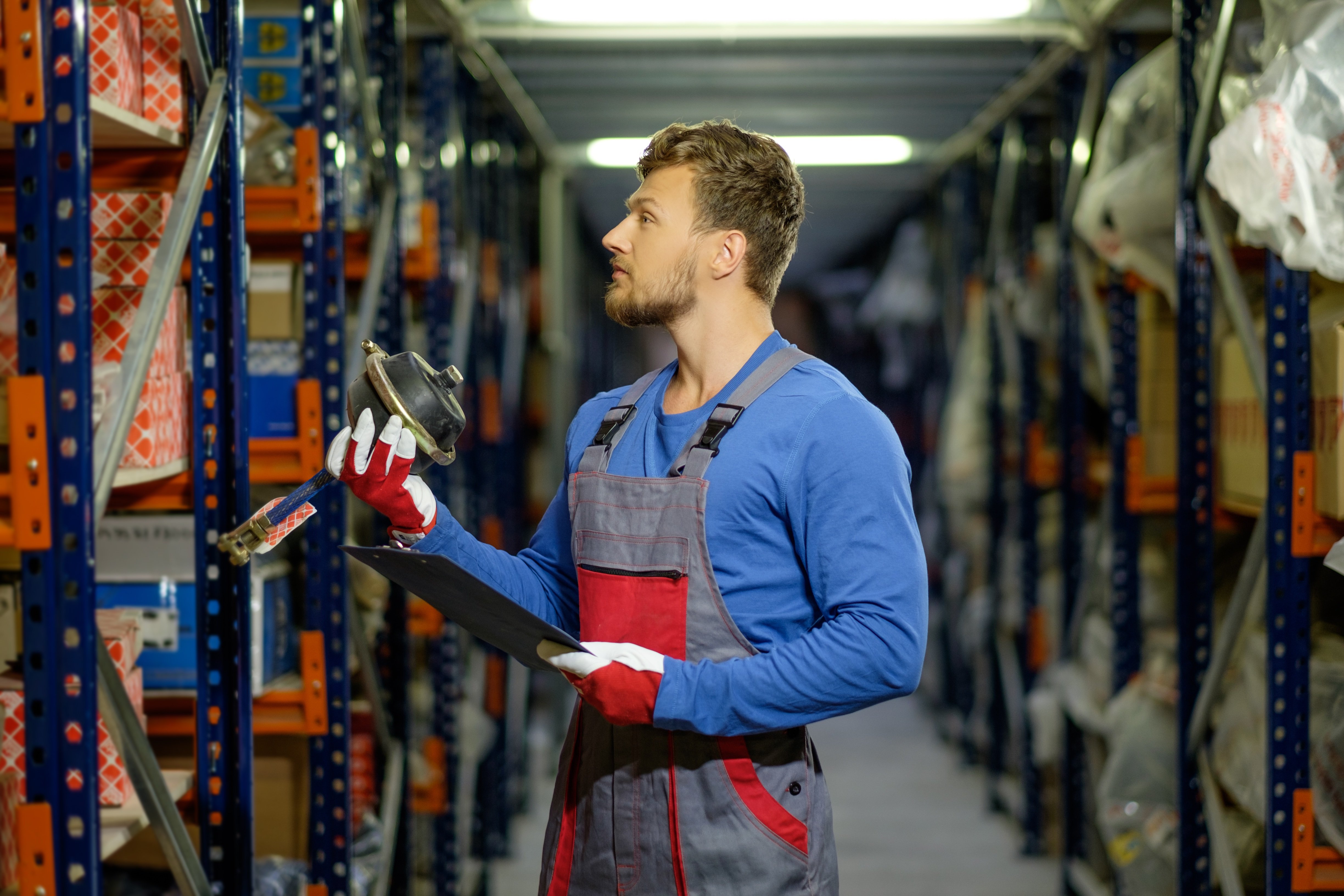 worker-on-a-automotive-spare-parts-warehouse-2021-08-26-16-21-10-utc (1)